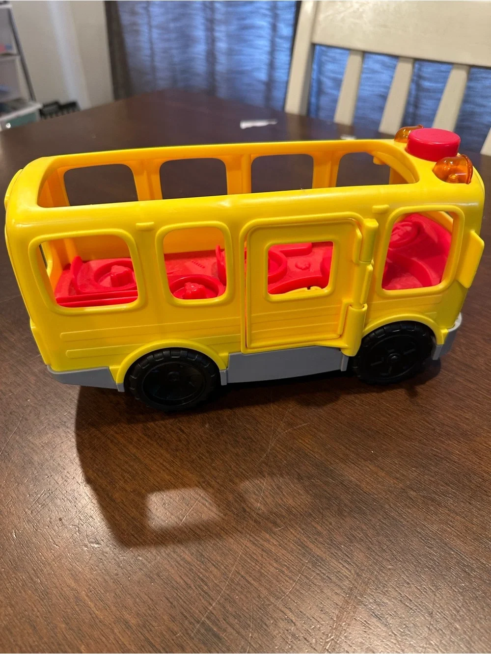 Fisher-Price Yellow and Red Smiling School Bus Toy